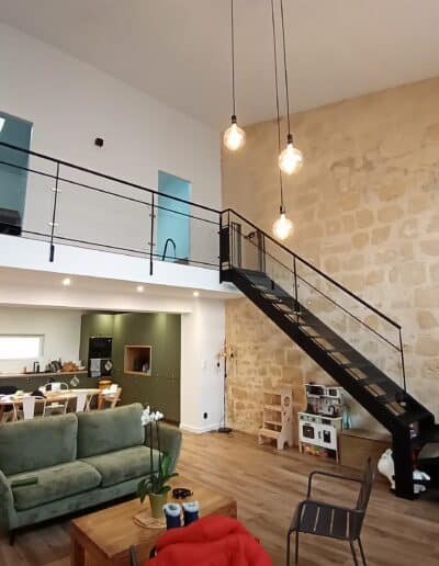 reconstruction d'une maison de ville Le Bouscat salon mur pierre